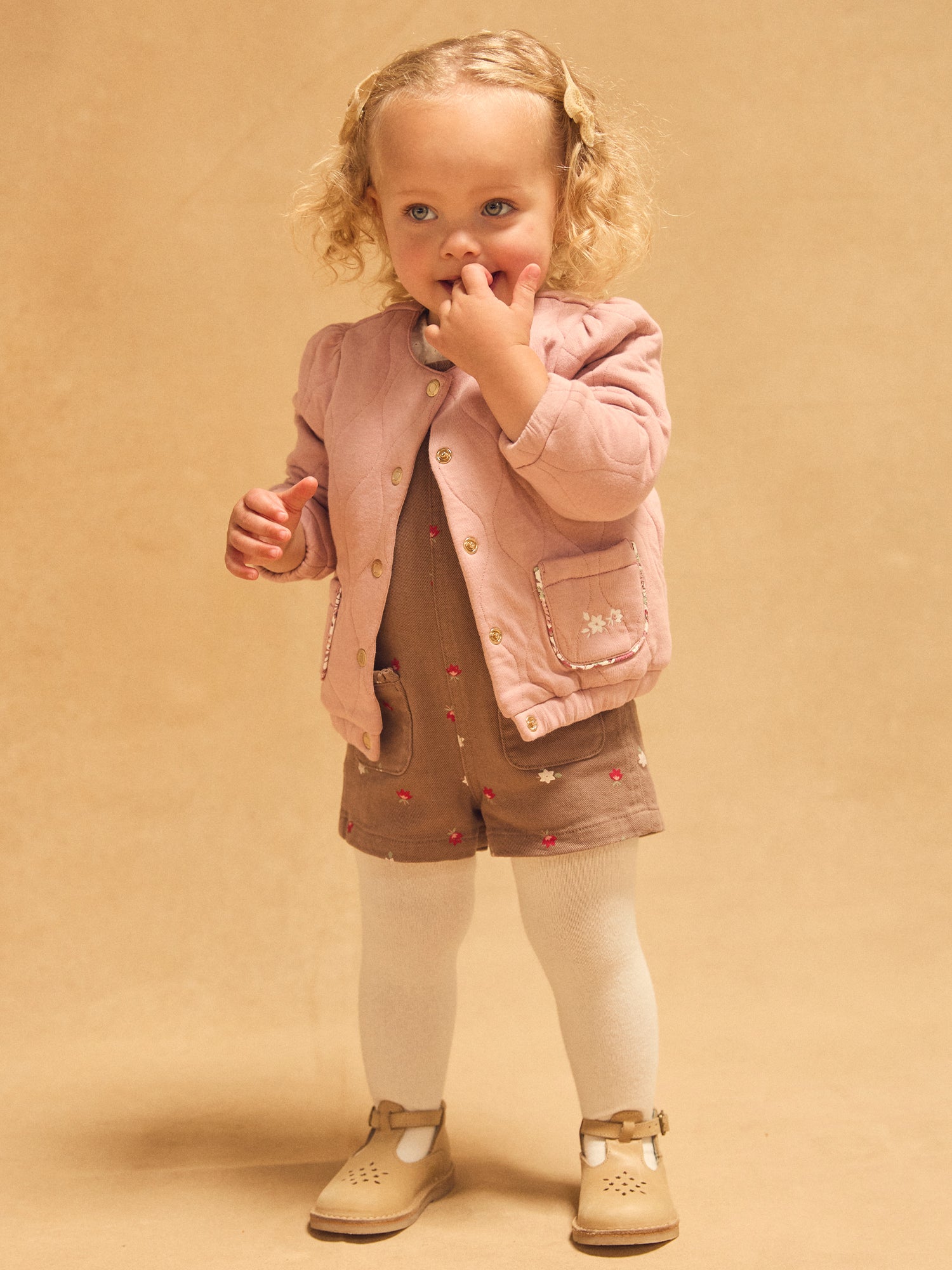 Cardigan trapuntato rosa pallido per bambine