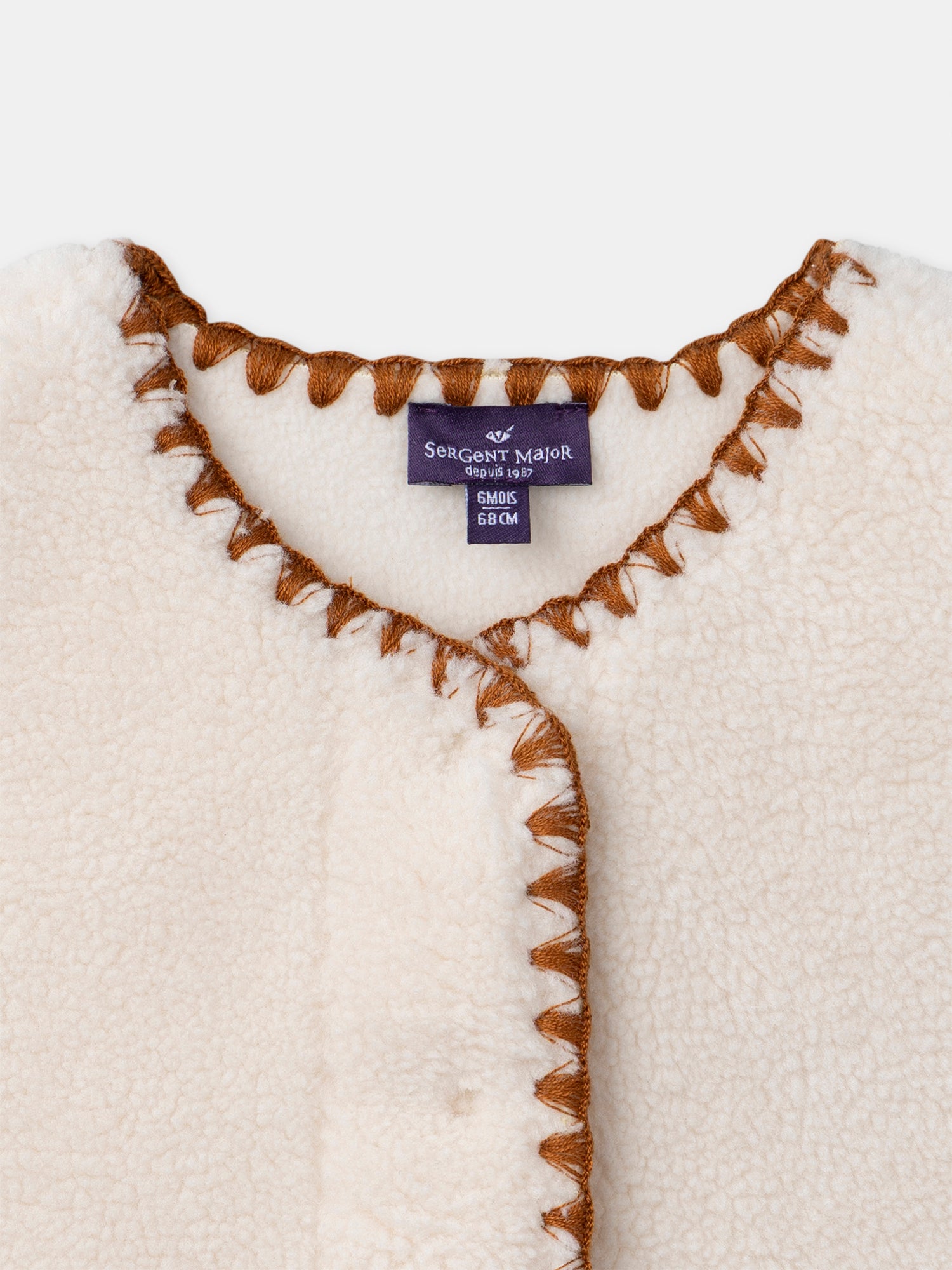 Cardigan ecru senza maniche bambina