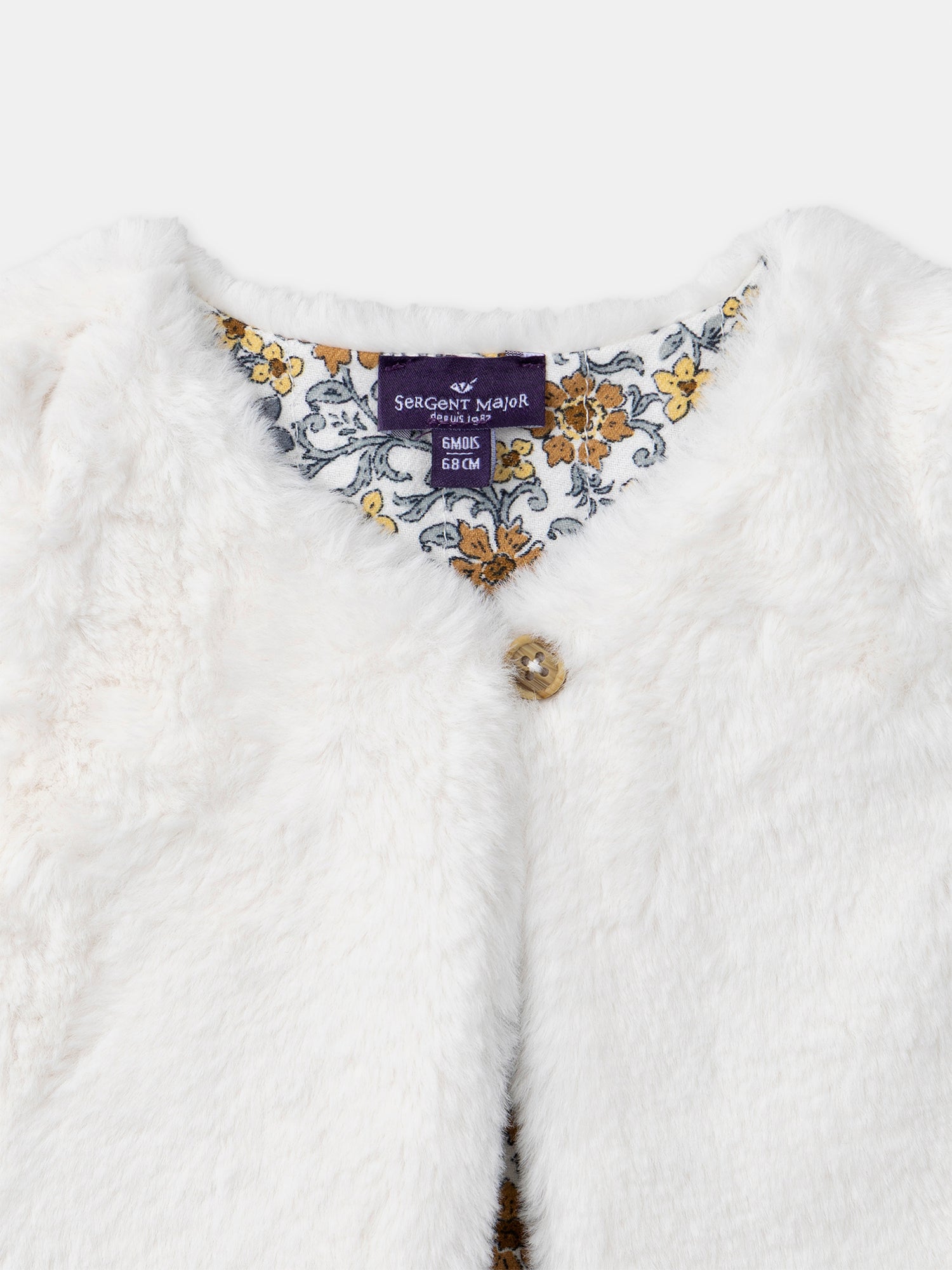 Gilet reversibile bianco in pelliccia o stampa floreale per bambina