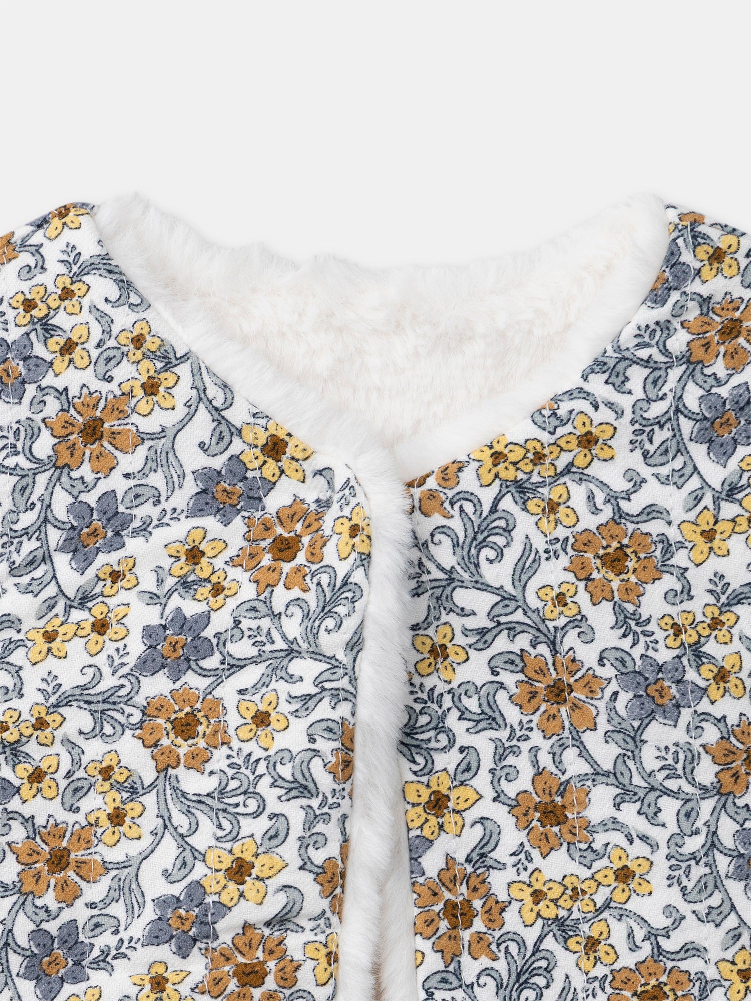 Gilet reversibile bianco in pelliccia o stampa floreale per bambina