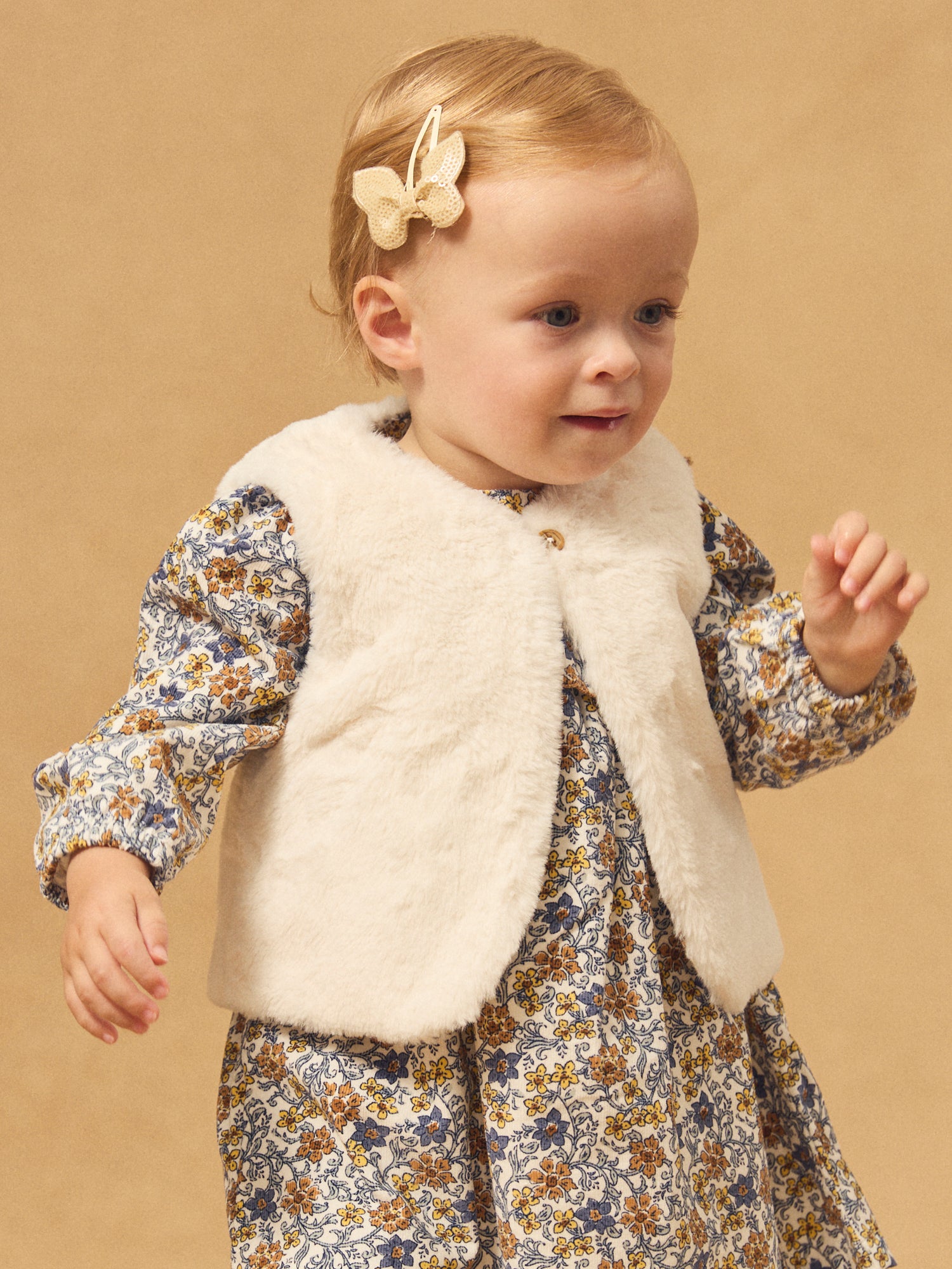 Cardigan reversibile bianco in pile o con stampa floreale per bambina