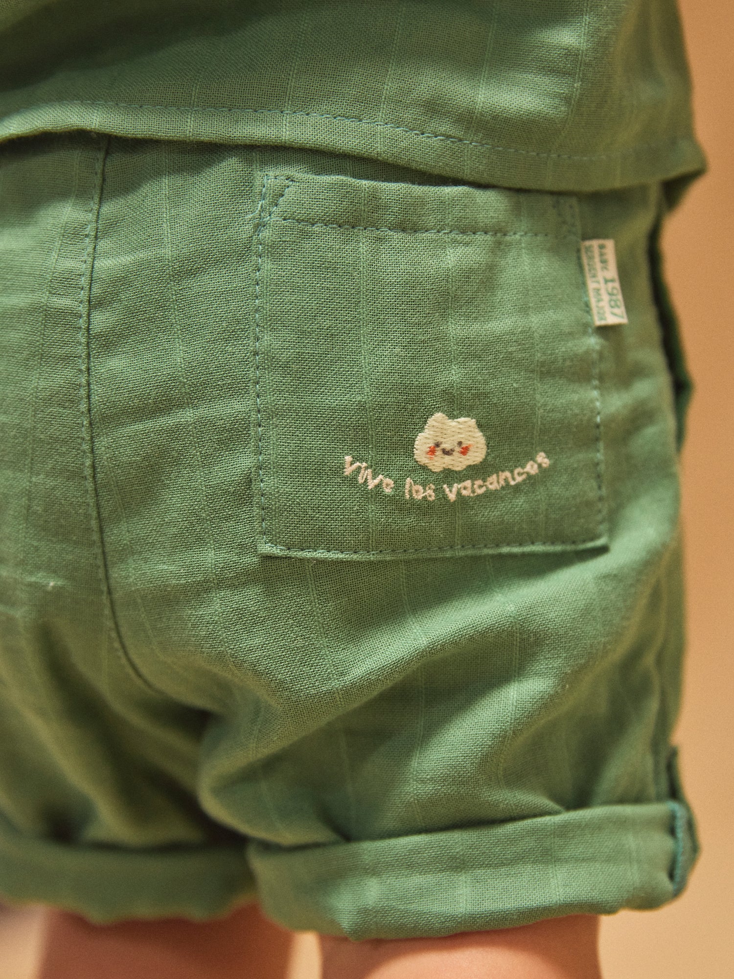 Pantaloni corti verde abete con gambe regolabili baby ragazzo