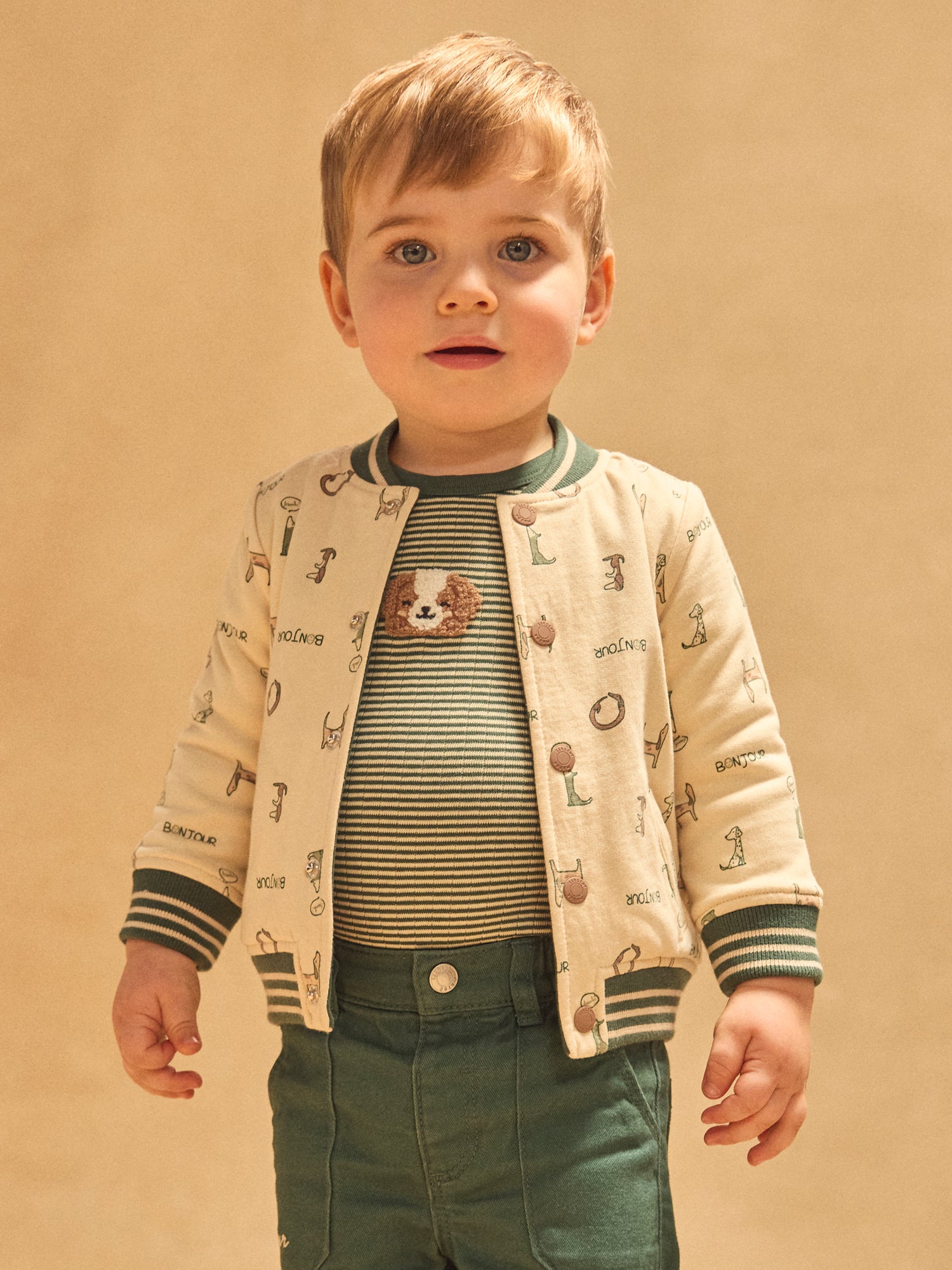 Teddy reversibile verde scuro unito o ecrù con cani stampati bambino