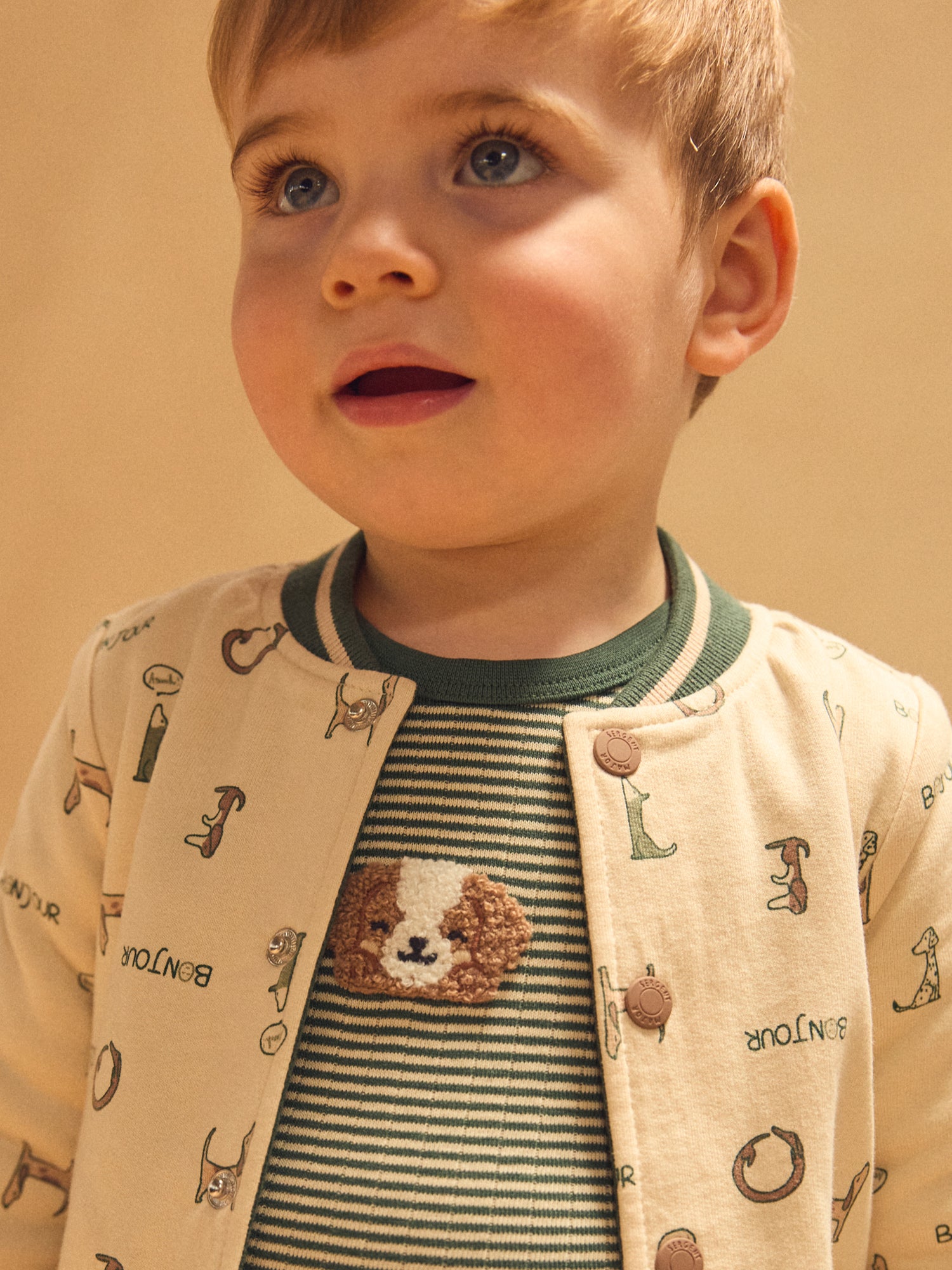 Teddy reversibile verde scuro unito o ecrù con cani stampati bambino