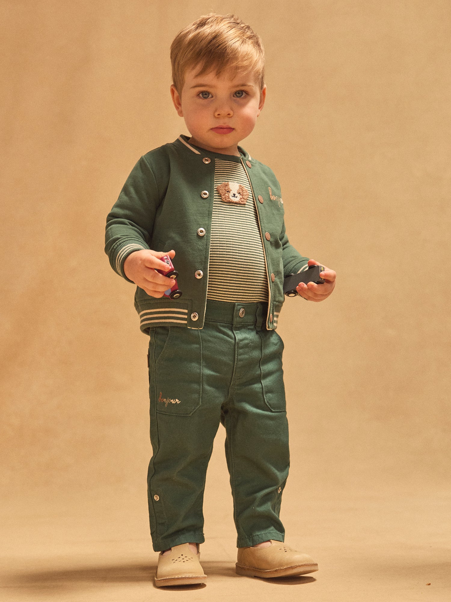 Teddy reversibile verde scuro unito o ecrù con cani stampati bambino