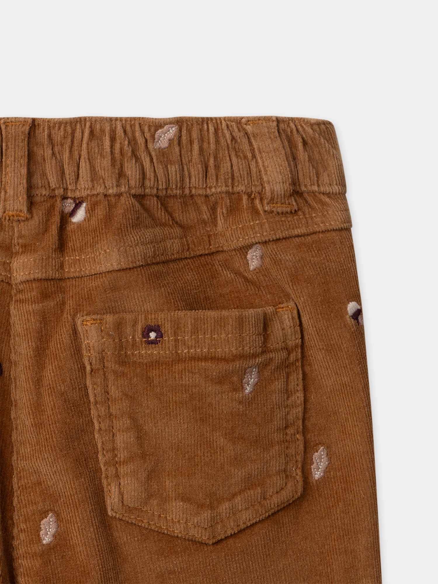 Pantaloni marroni in velluto a coste con ricamo di nappine per bambine