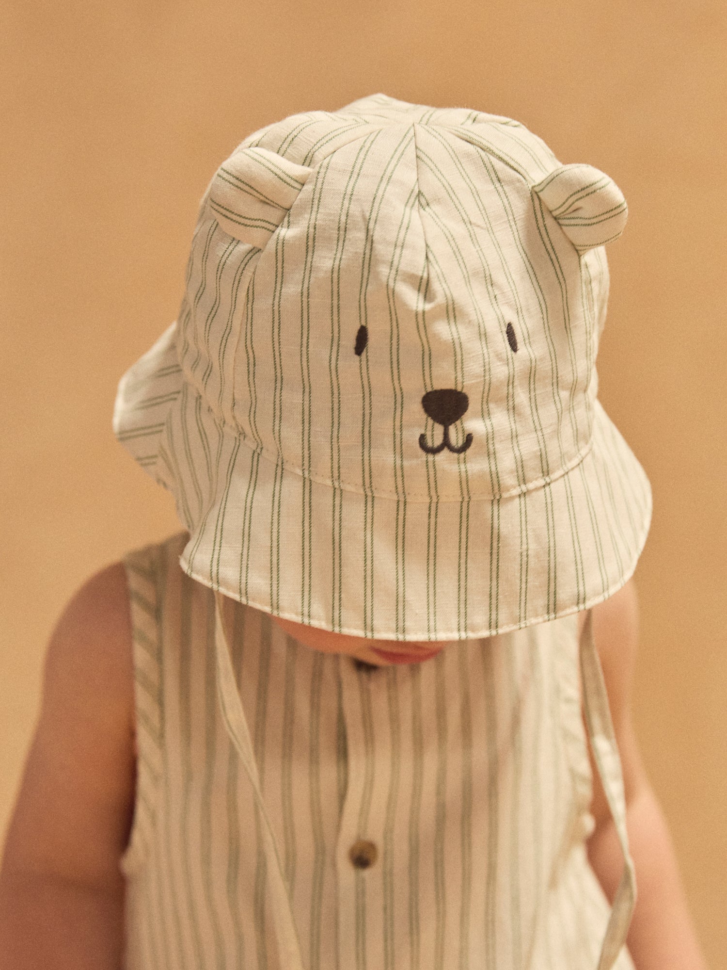 Cappello Bucket Reversibile con Orsetti Bianchi e Strisce Verdi Bambino