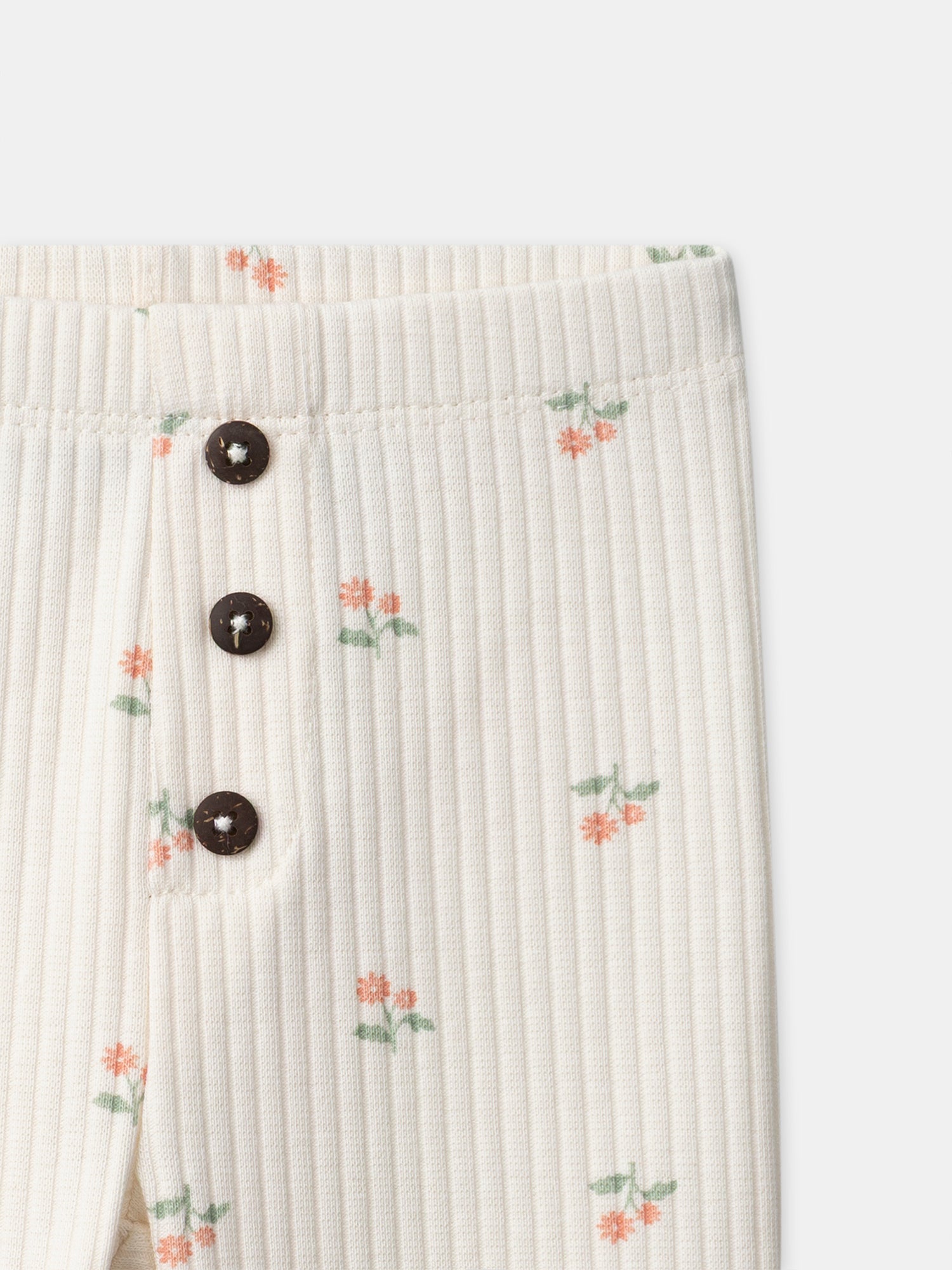 Leggings avorio con stampa floreale per bambina