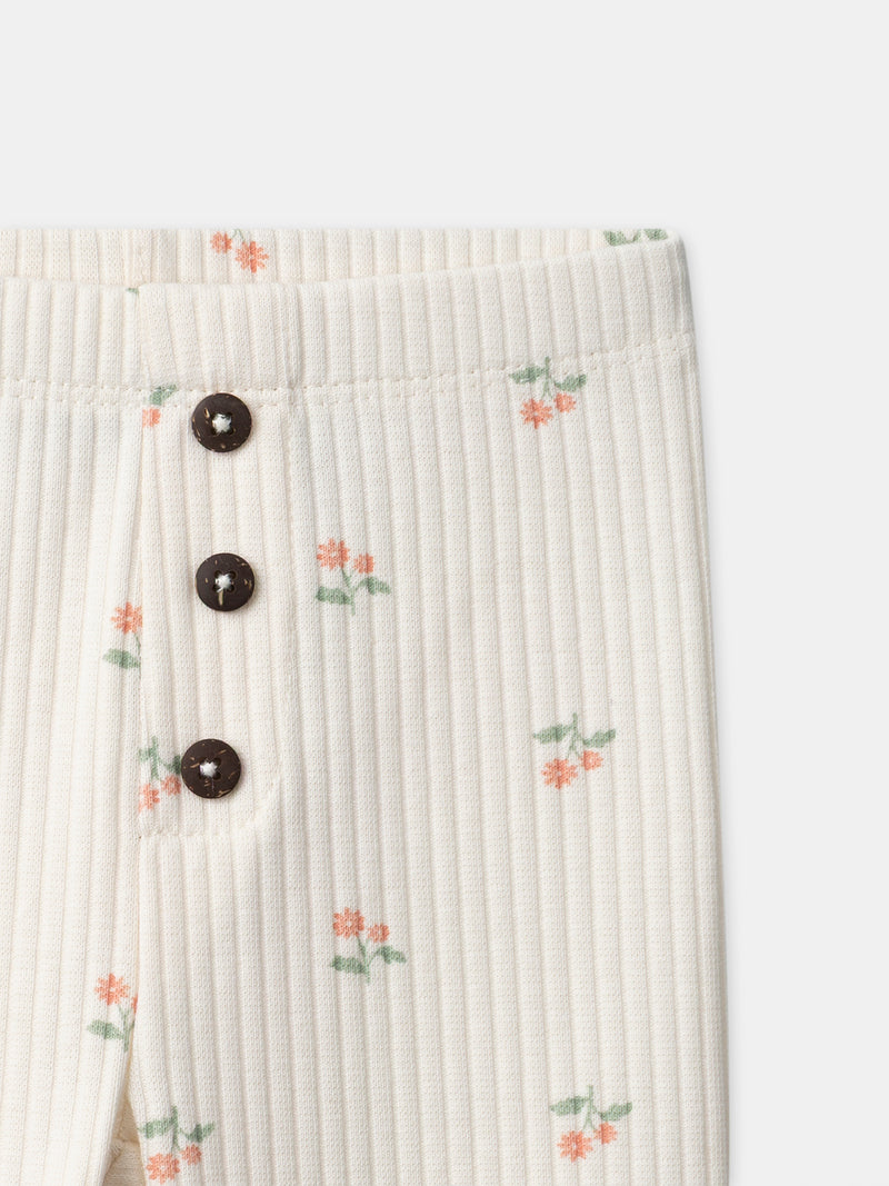 Leggings avorio con stampa floreale per bambina