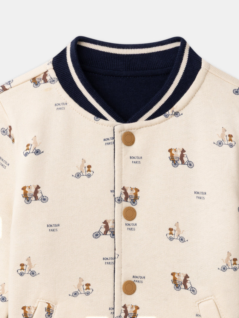 Teddy reversibile blu navy o écru con stampa di cani per bambino