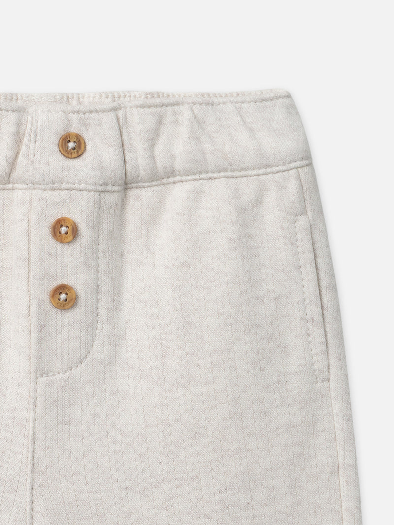 Pantaloni ecru con faccia di animale per bambino