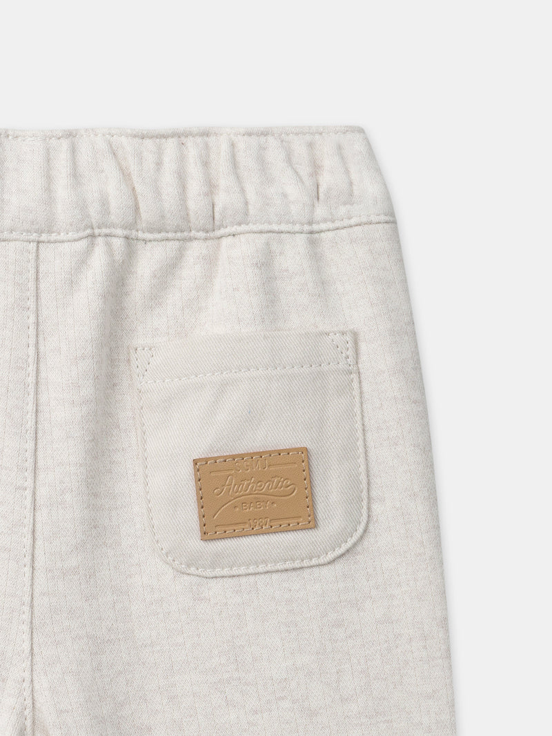 Pantaloni ecru con faccia di animale per bambino