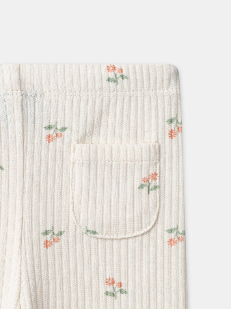 Leggings avorio con stampa floreale per bambina