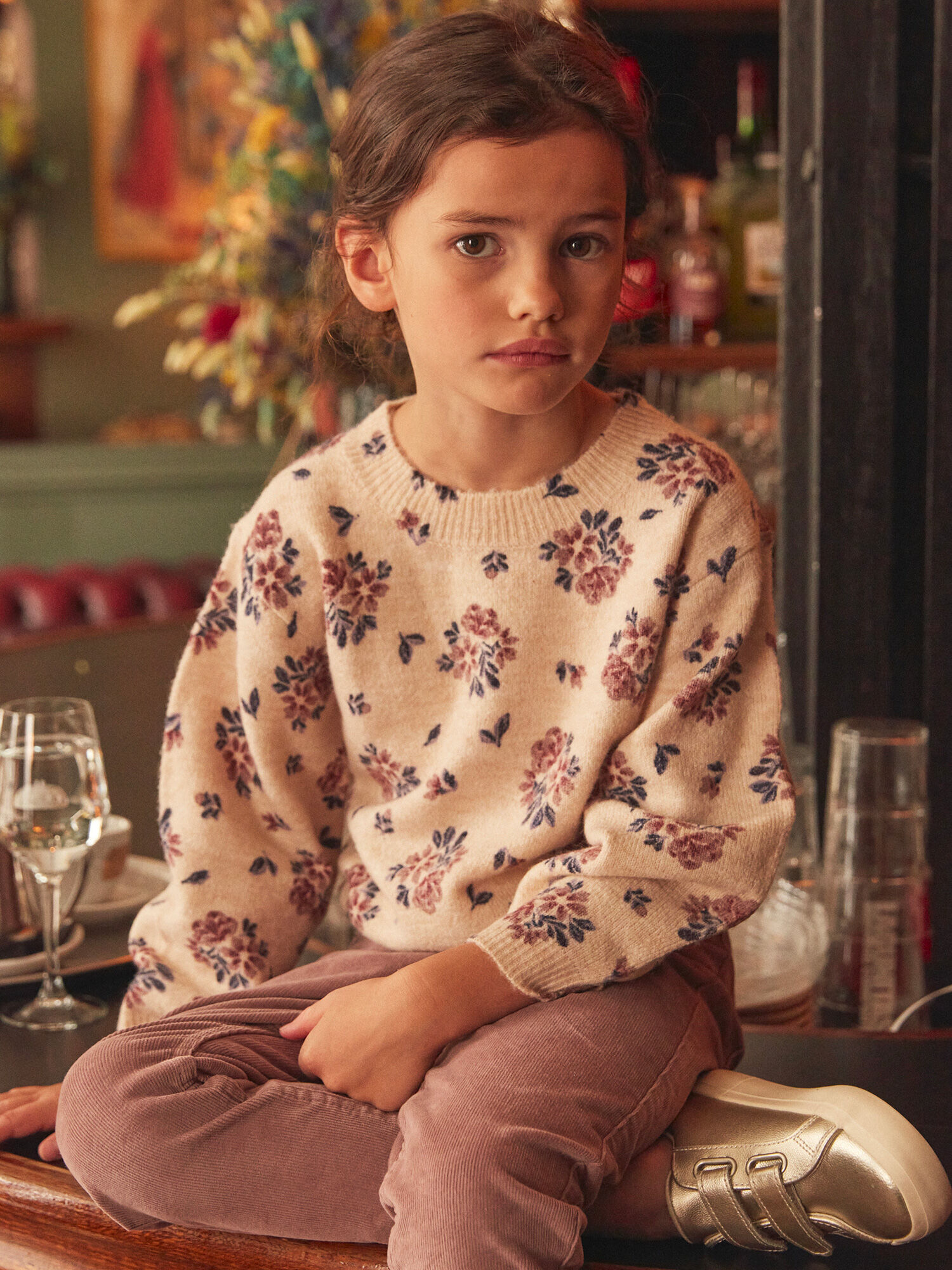 Maglia beige con stampa a fiori