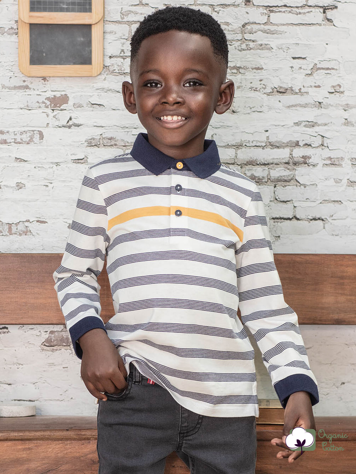 Polo bianca e navy a righe bambino